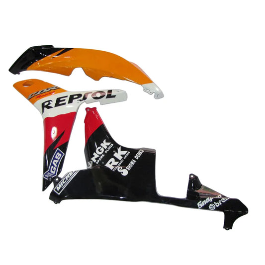 Close-up detail of orange black repsol fairing kit for Honda CBR60ORR-1
